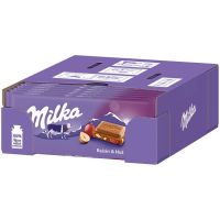 Шоколад Milka Raisins & Nuts изюм с орехом 100 г